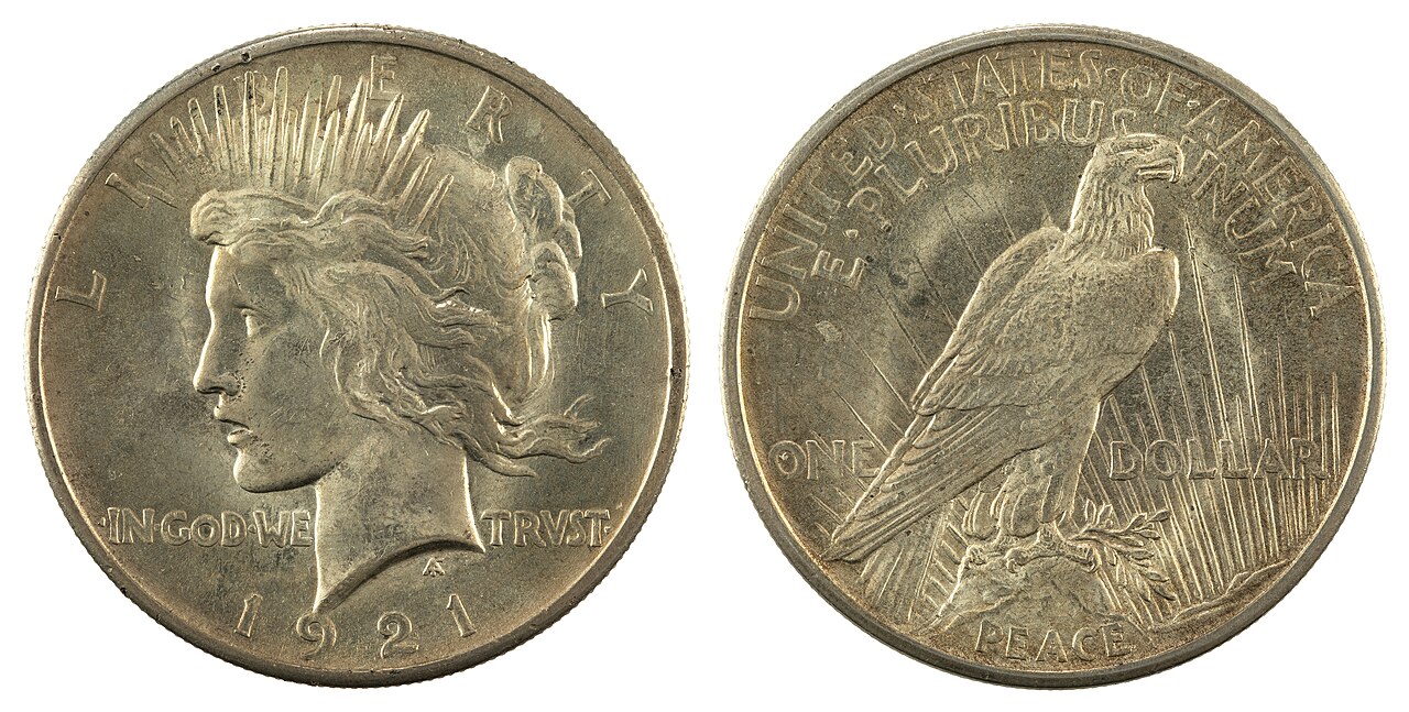 Both sides of a 1921 Peace silver dollar